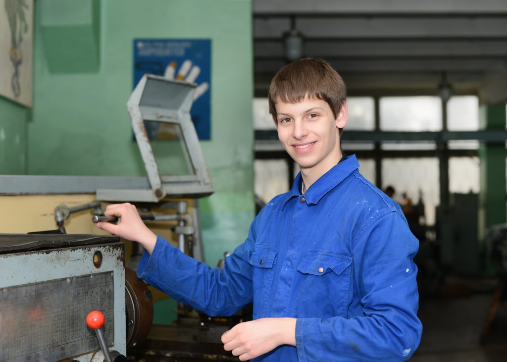 Turner,Is,Working,On,The,Machine.metal,Processing.worker,Works,On,A